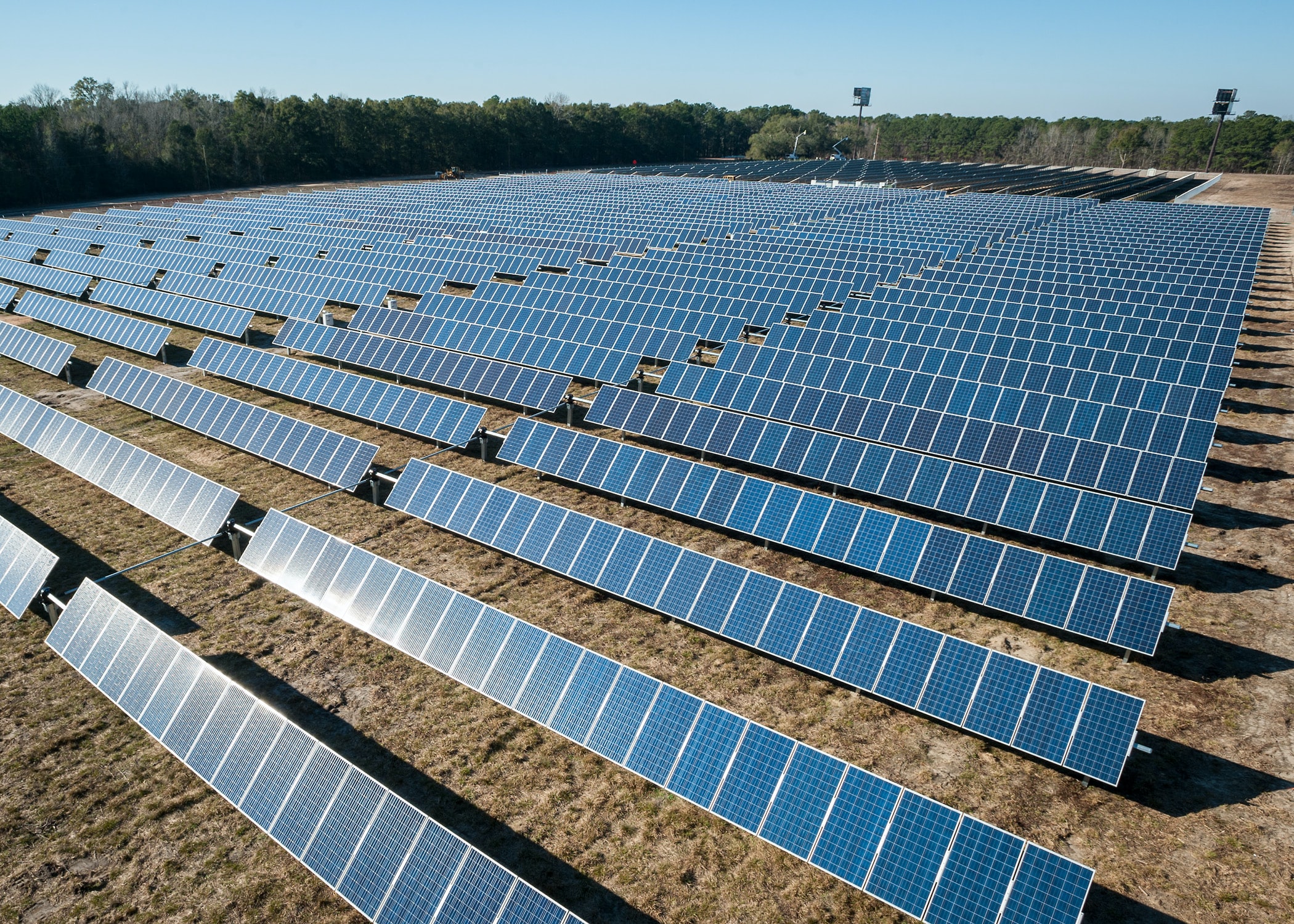 Engineers installing solar panels